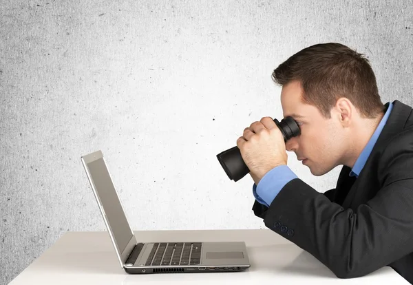 Searching, Binoculars, Computer. Stock Image