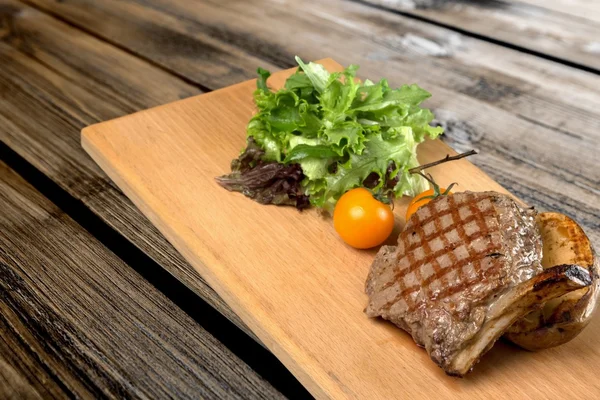 Steak, mustard, salad. — Stock Photo, Image