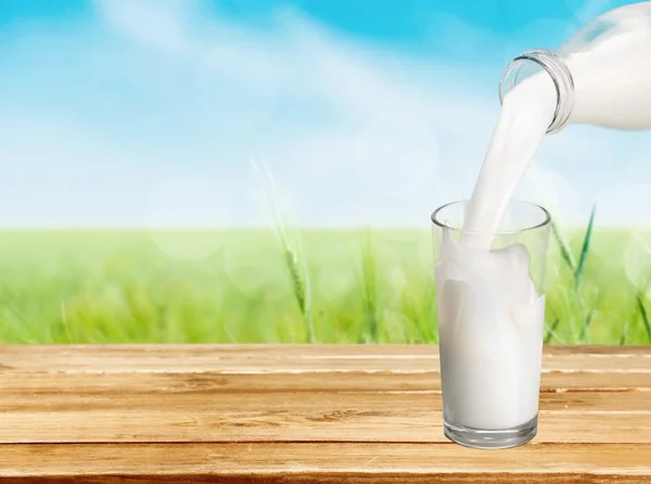 Milk, Milk Bottle, Pouring. — Stock Photo, Image