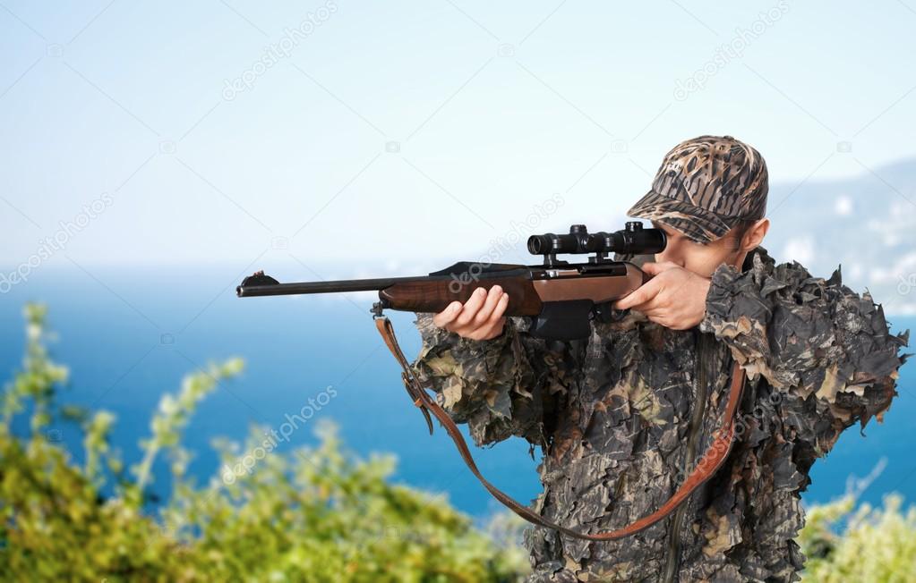 Hunter, Hunting, Rifle. — Stock Photo © billiondigital 74310551
