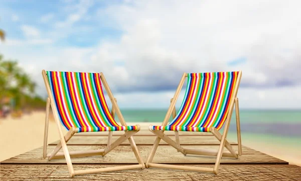 Pláž, židle, slunečník. — Stock fotografie