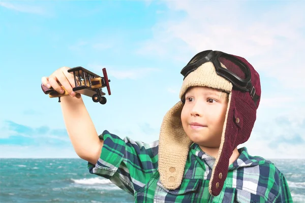 Plane, pilot, toy. — Stock Photo, Image