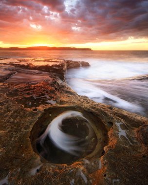 rockpool at sunrise near Pearl Beach on NSW Central Coast clipart