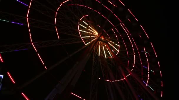 Luces de la rueda de la fortuna en la noche — Vídeos de Stock