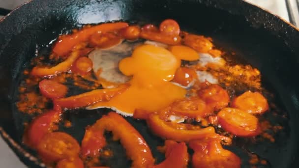 Fried Eggs with Vegetables Prepared on a Frying Pan — Stock Video