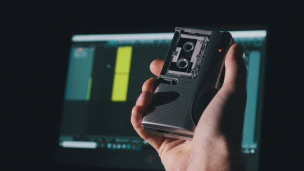 Portable Tape Recorder in Hand Records Sound or Interviews on a Mini Cassette — 비디오