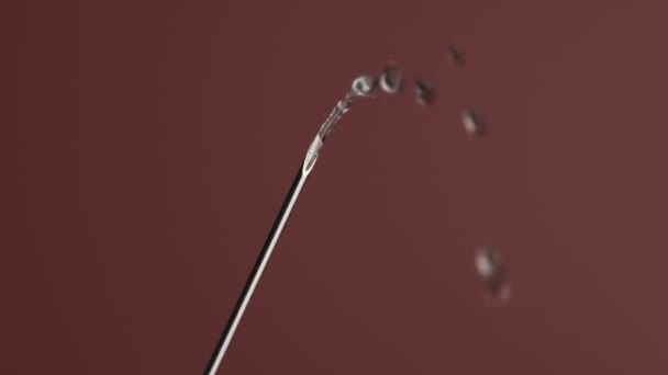 Syringe Needle with Liquid Dripping Drops of Medication in slow Motion 240 fps — 비디오