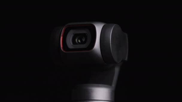 Mechanical Gimbal Camera Lens Rotates on Black Background, Robotic Camera Macro — Stock Video