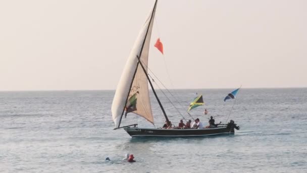 African Wooden Dhow Boat Sailing by Turquoise Indian Ocean, Zanzibar, Tanzania — стокове відео