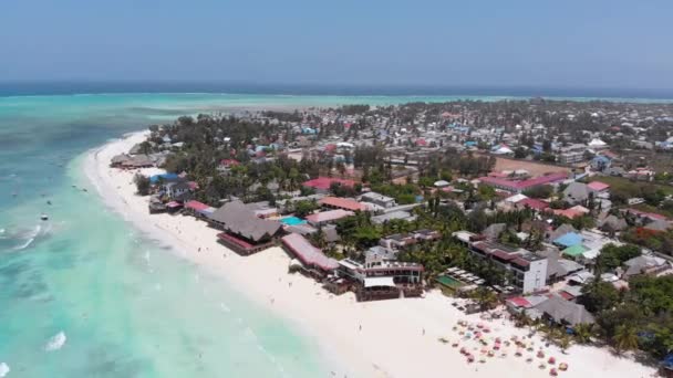 Aerial Paradise Sandy Beach with Turquoise Ocean and Luxury Hotels in Zanzibar — стокове відео