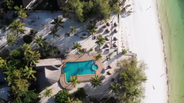 Aerial view African Tropical Beach Resort, Thatched-Roof Hotels, Pools, Zanzibar — 图库视频影像