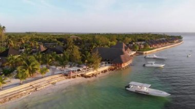 Paradise Beach Resort with Palm Trees and Hotels by Ocean, Zanzibar, Aerial view