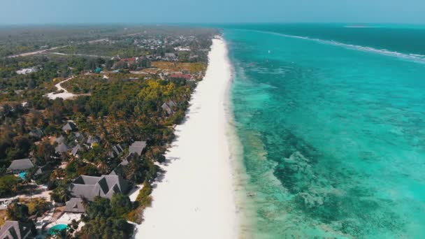 Ocean Coastline, Barrier Reef by Beach Hotels at Low Tide, Zanzibar, Aerial View — Stock Video