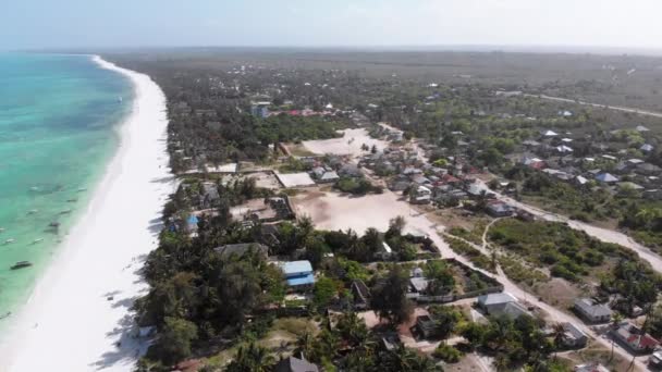 Ocean Coastline, Barrier Reef by Beach Hotels at Low Tide, Zanzibar, Aerial View — Stock Video