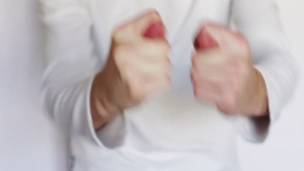 Man shows gestures and signs with his hands. — Stock Video