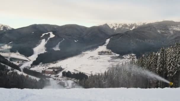 Clouds moving over the mountains and winter Christmas trees. — Stock Video