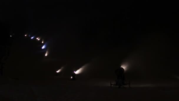 Snow cannons are working at night. — Stock Video