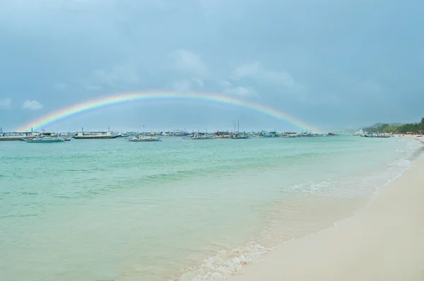 Rainbow over the pier — Stock Photo, Image