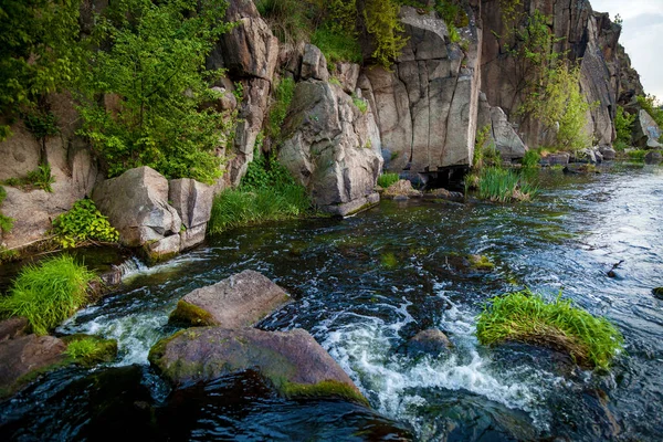 Boguslavsky granite canyon, Ukraine. Rapid flow of the Ros river near granite rocks. Sights and nature of Ukraine.