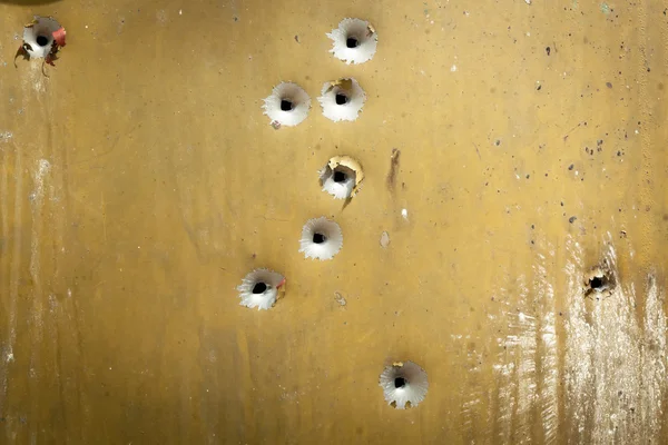 Bullet holes, texture, metal, shooting, shooting on the street, shot, target, bullet, grapeshot, gunpowder, background Obrazek Stockowy