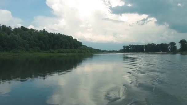 Traveling along the river, river rafting, wildlife, beautiful scenery, boat, speed, splash, water, ocean, background, white, wave, motor — Stock Video