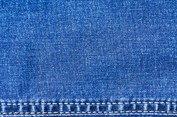 Blue jeans material with stitched stripe track texture background — Stock Photo, Image