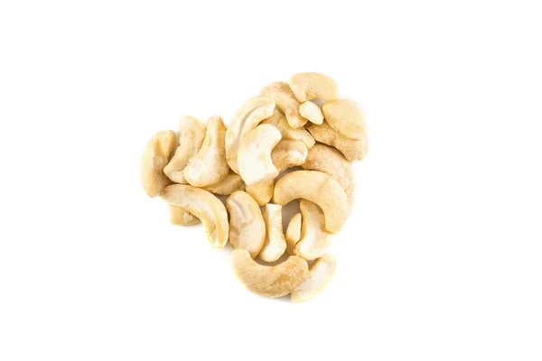 Cashew nuts in a heart shape isolated on white — Stock Photo, Image
