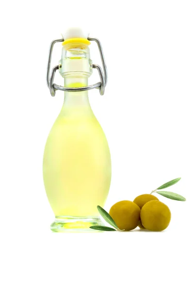 Bottle of olive oil and olives with leaves isolated on a white — Stock Photo, Image