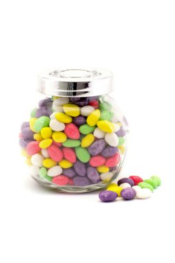 Colorful candy in glass bottles isolated  clipart