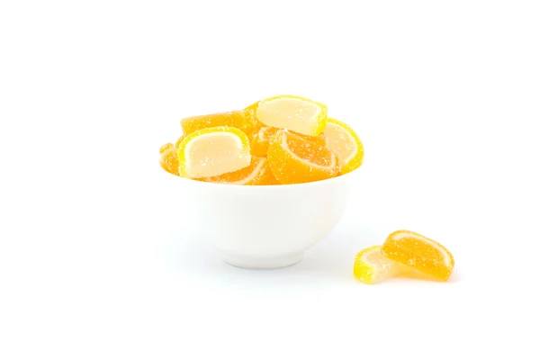 Slices of fruit jelly candy in cups isolated — Stock Photo, Image