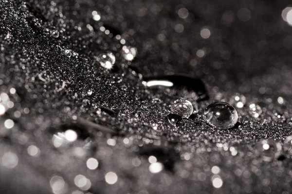 Gotas de água close-up macro em material de veludo — Fotografia de Stock