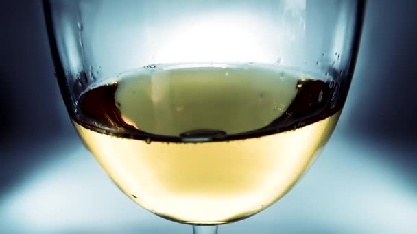 Creative Macro Slow Motion Video White Wine Splashing Glass Side — Stock Video