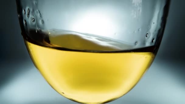 Creative Macro Slow Motion Video White Wine Splashing Glass Side — Stock Video