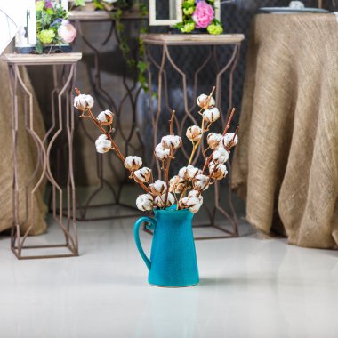 Cotton branch in a vase