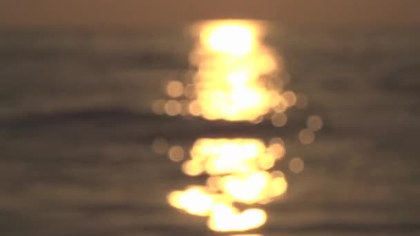 Golden sunlight path reflection on sea — Stock Video