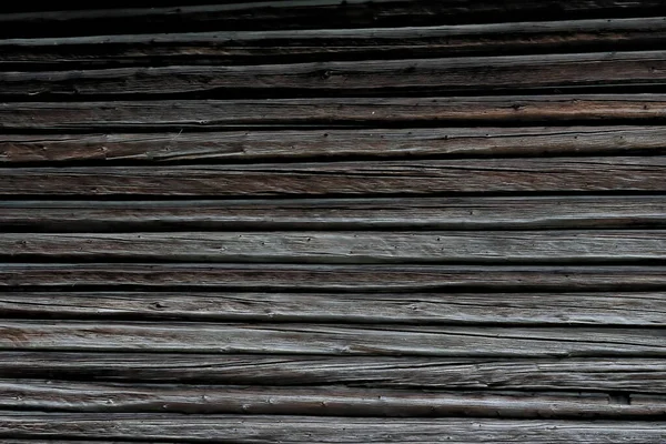 Eski ahşap bir duvar, eski bir kulübe ya da ahır olabilir..