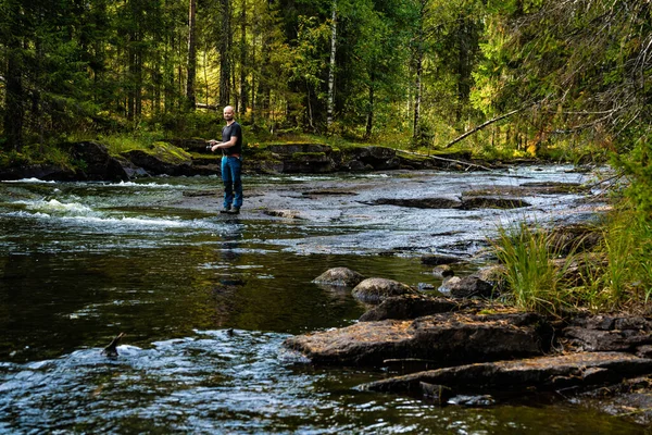 Male Hiker Fishing Stream Running Wild Forest High Quality Photo — Stock Photo, Image
