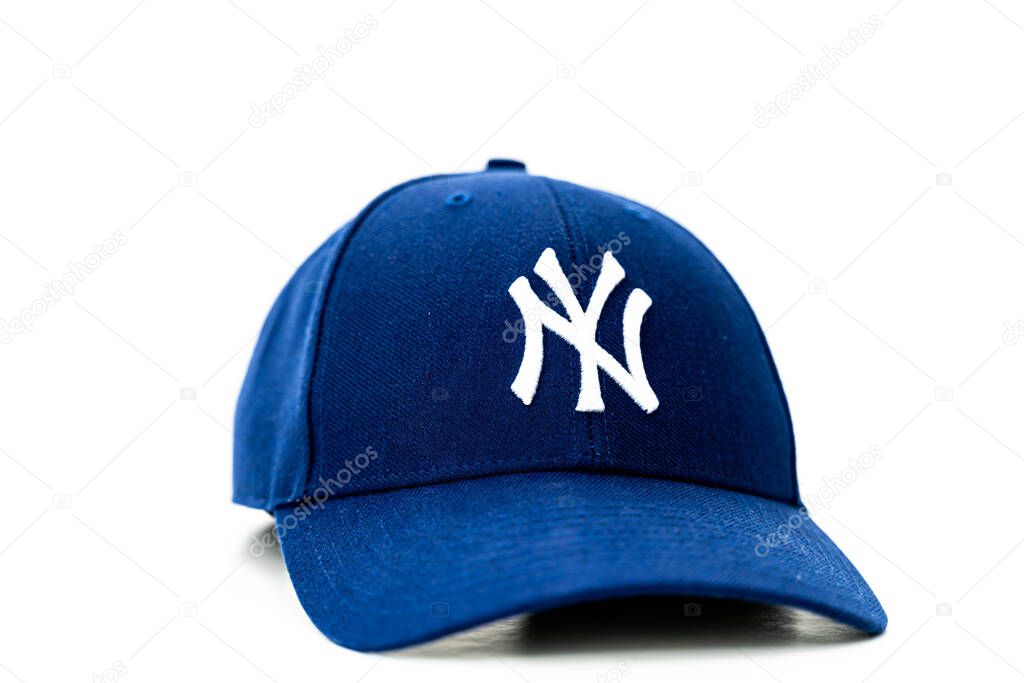 Blue Baseball hat with NY logo in white on the front. Isolated on white background. High quality photo