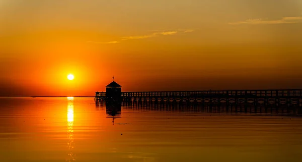 Large Wooden Pier Beach Sunset Bridge Black Silhouette Sky Saturated — Stock Photo, Image