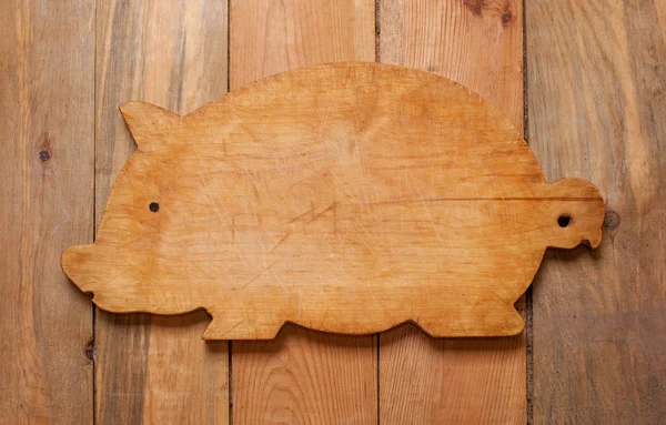 古い木製 table01 に豚の形のまな板 — ストック写真
