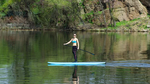 Slim athletic girl stand up paddle board SUP02 — Stock Photo, Image