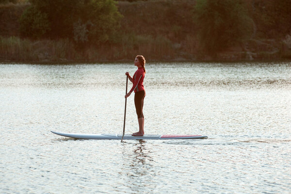 SUP Stand up paddle board woman paddle boarding12