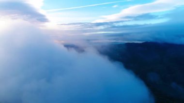 Bulutların üzerinden İHA Uçuşu