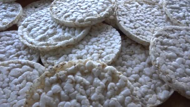 Close up view fresh made rotating Rice Cakes — Stock video