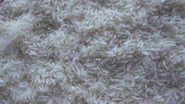 Bovenaanzicht van witte rijst draaiend — Stockvideo