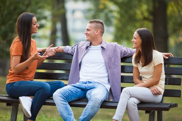 Three friends in park — Stock Photo, Image