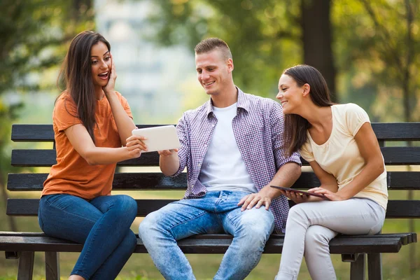 Three friends in park — Stock Photo, Image