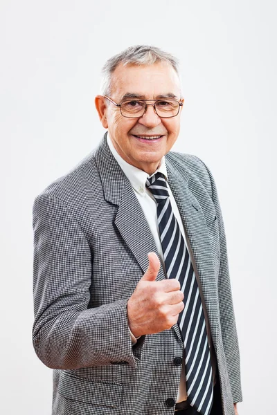 Zufriedener Senior-Geschäftsmann — Stockfoto