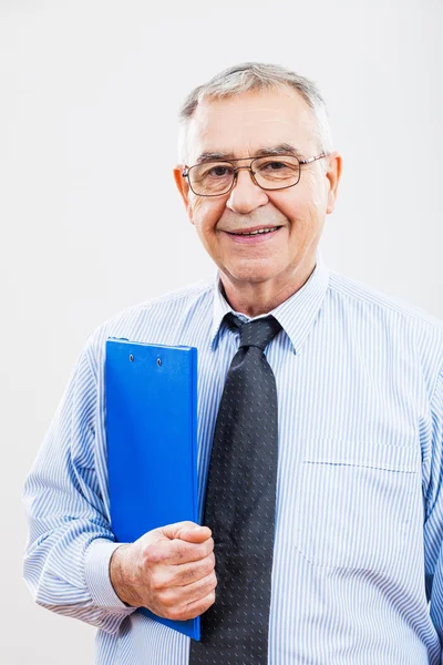 Zufriedener Senior-Geschäftsmann — Stockfoto