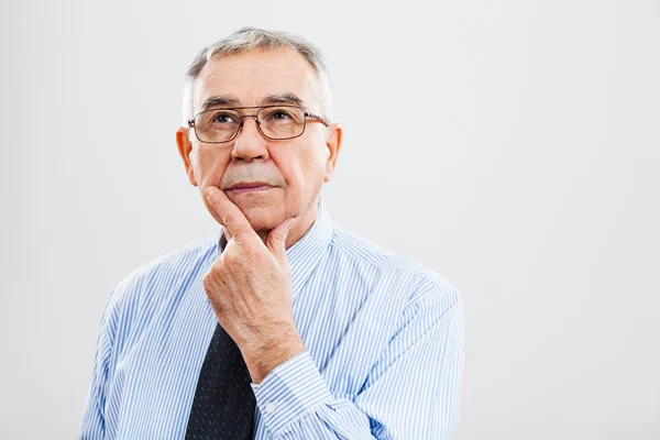 Senior businessman thinking — Stock Photo, Image